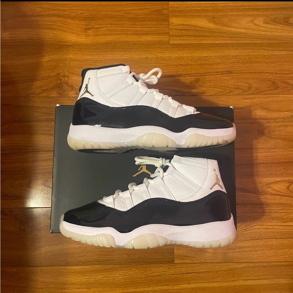 Jordan 11 Retro White and Metallic Gold Sneakers